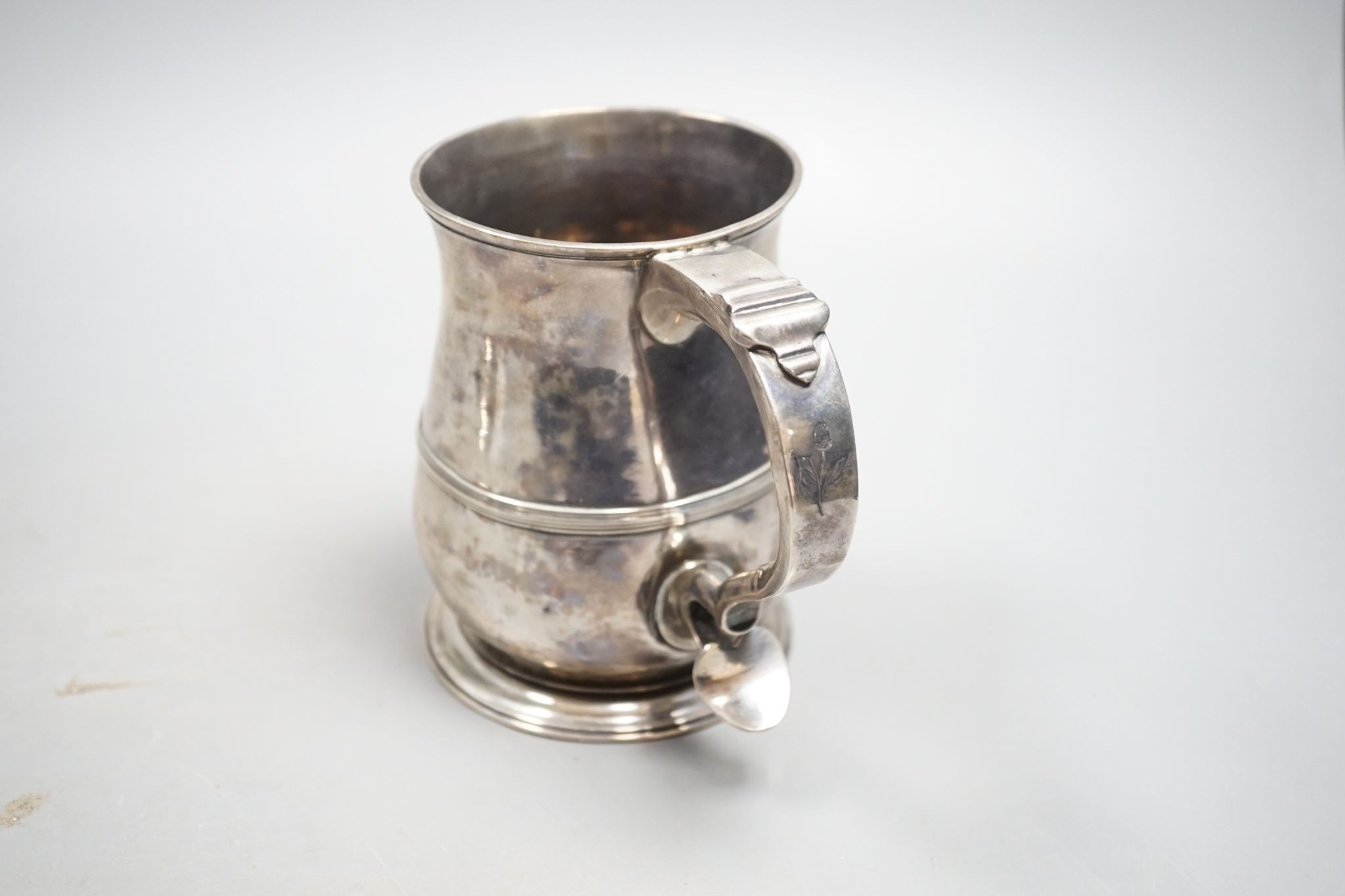 A George II silver baluster mug, with banded girdle, Benjamin Cartwright I, London, 1751, 12.2cm, 10.5oz.